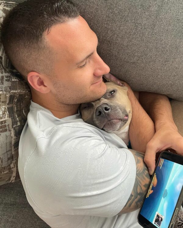 The Heartfelt Secret This Adopted Pitbull Hid From His New Family-1