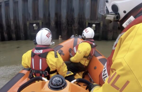 You Won't Believe What Rescuers Found Clinging to the River Wall-1